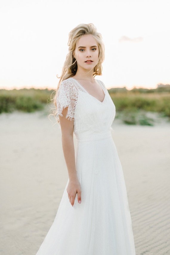 plunge mermaid wedding dress