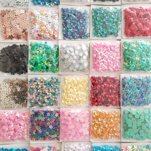 30 x  4 g packs of  Flower Sequins to Sew On or Glue On for decorating Creativity