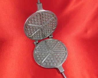 quattro pizzelle baker