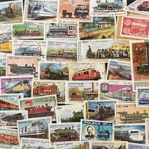 May include: A collection of vintage postage stamps featuring various trains, locomotives, and railway scenes from countries including Cuba, Vietnam, and Poland. The stamps display diverse colors, intricate illustrations, and printed text.