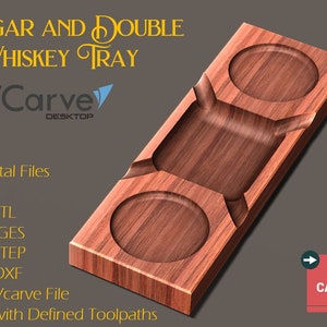 May include: A wooden cigar and double whiskey tray with two circular recesses and a central rectangular groove. The tray is made of a reddish-brown wood and features the text "Cigar and Double Whiskey Tray" and "VCarve Desktop". Digital files are available.