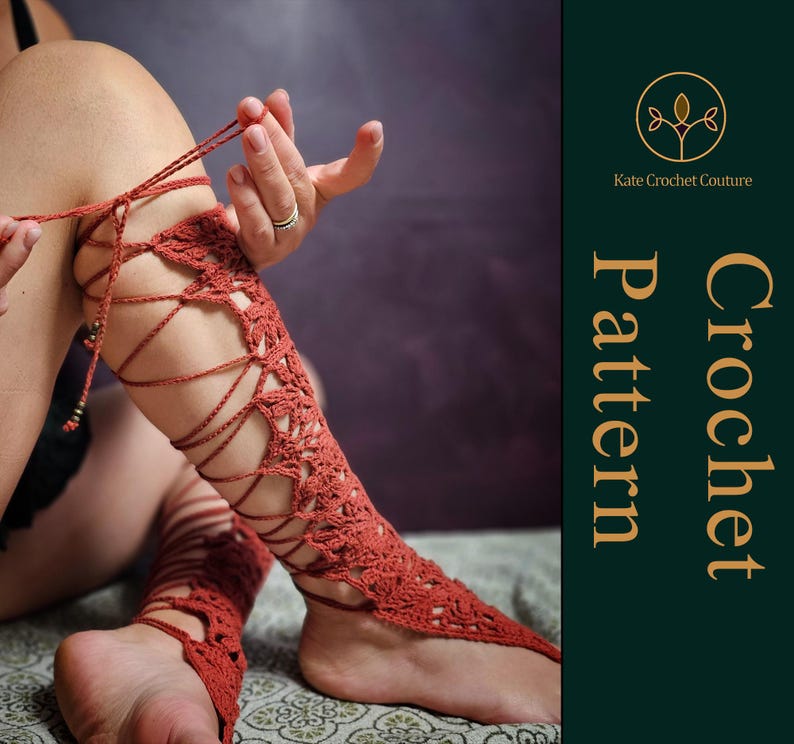 May include: Rust-coloured crochet leg wraps with detailed openwork and lace-up design. The wraps cover the foot and extend to the knee, with a toe loop and lacing. The image also includes the text "Kate Crochet Couture Crochet Pattern".