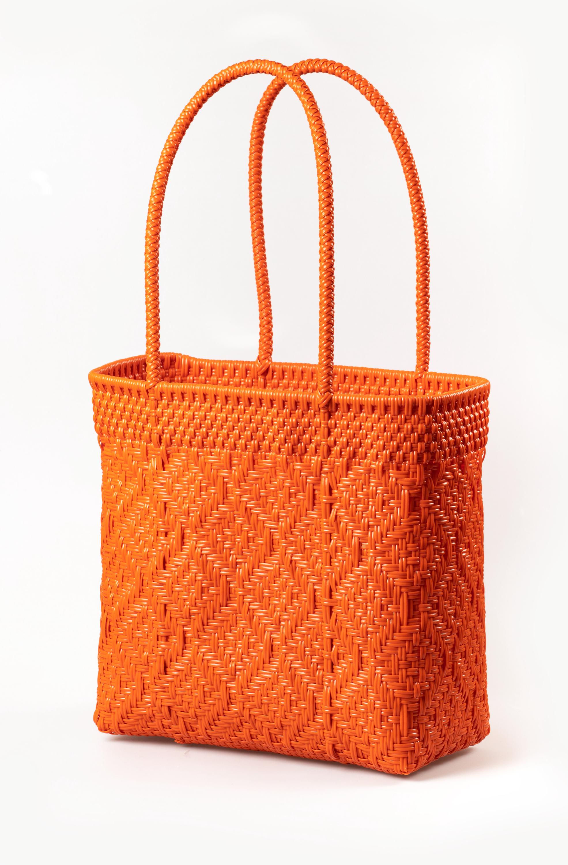 Orange Woven Plastic Tote Bag: Durable Beach Bag With Pompom