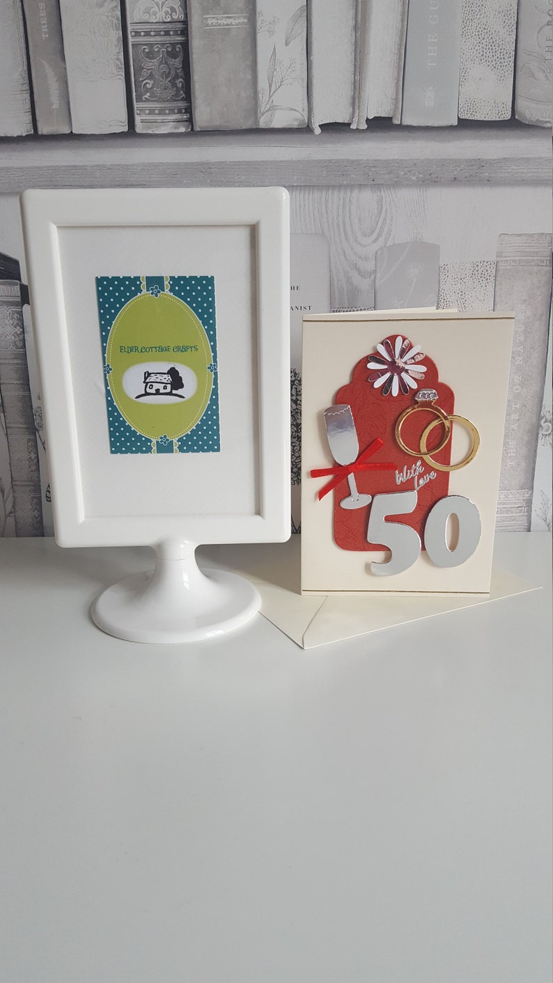 silver and gold on a cream card golden 50th wedding anniversary card in red