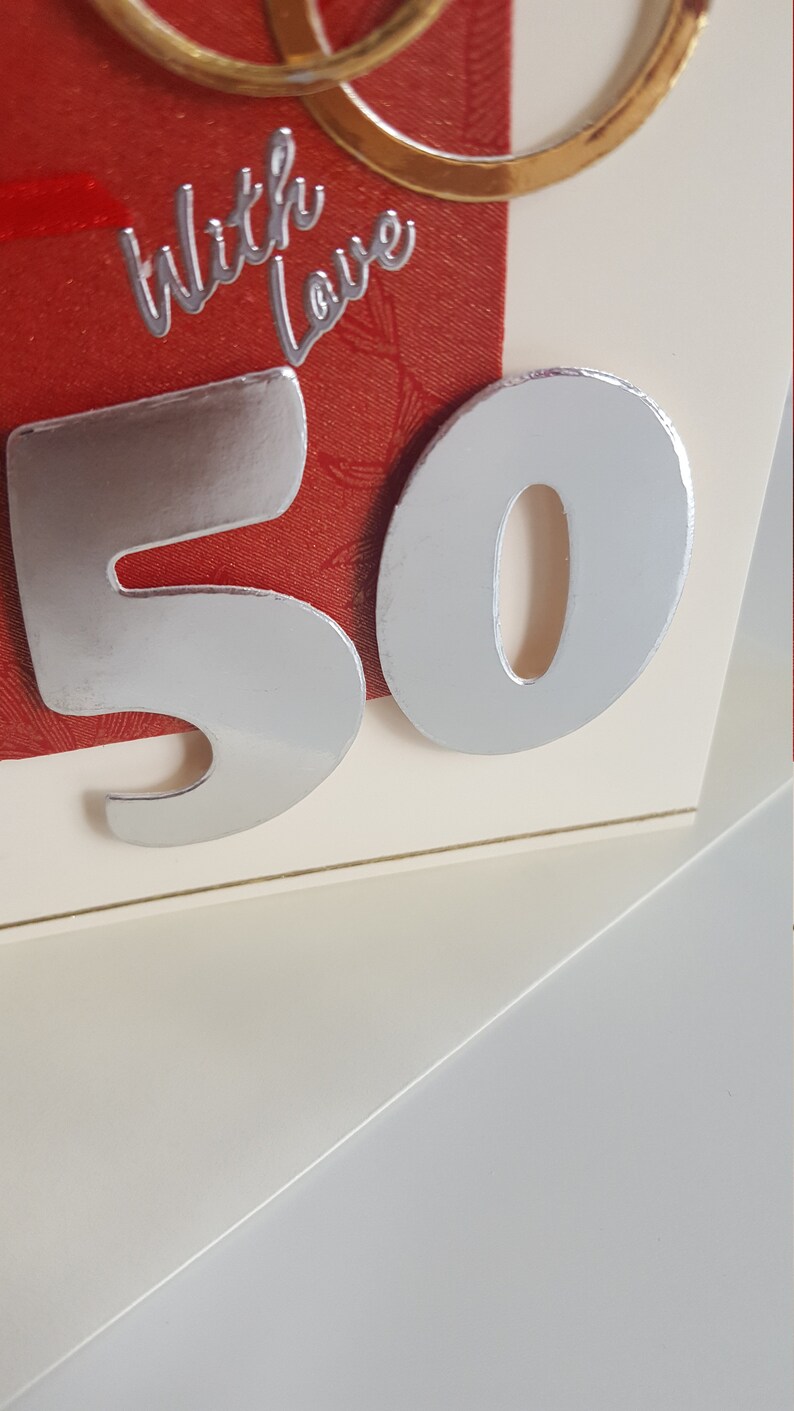 silver and gold on a cream card golden 50th wedding anniversary card in red