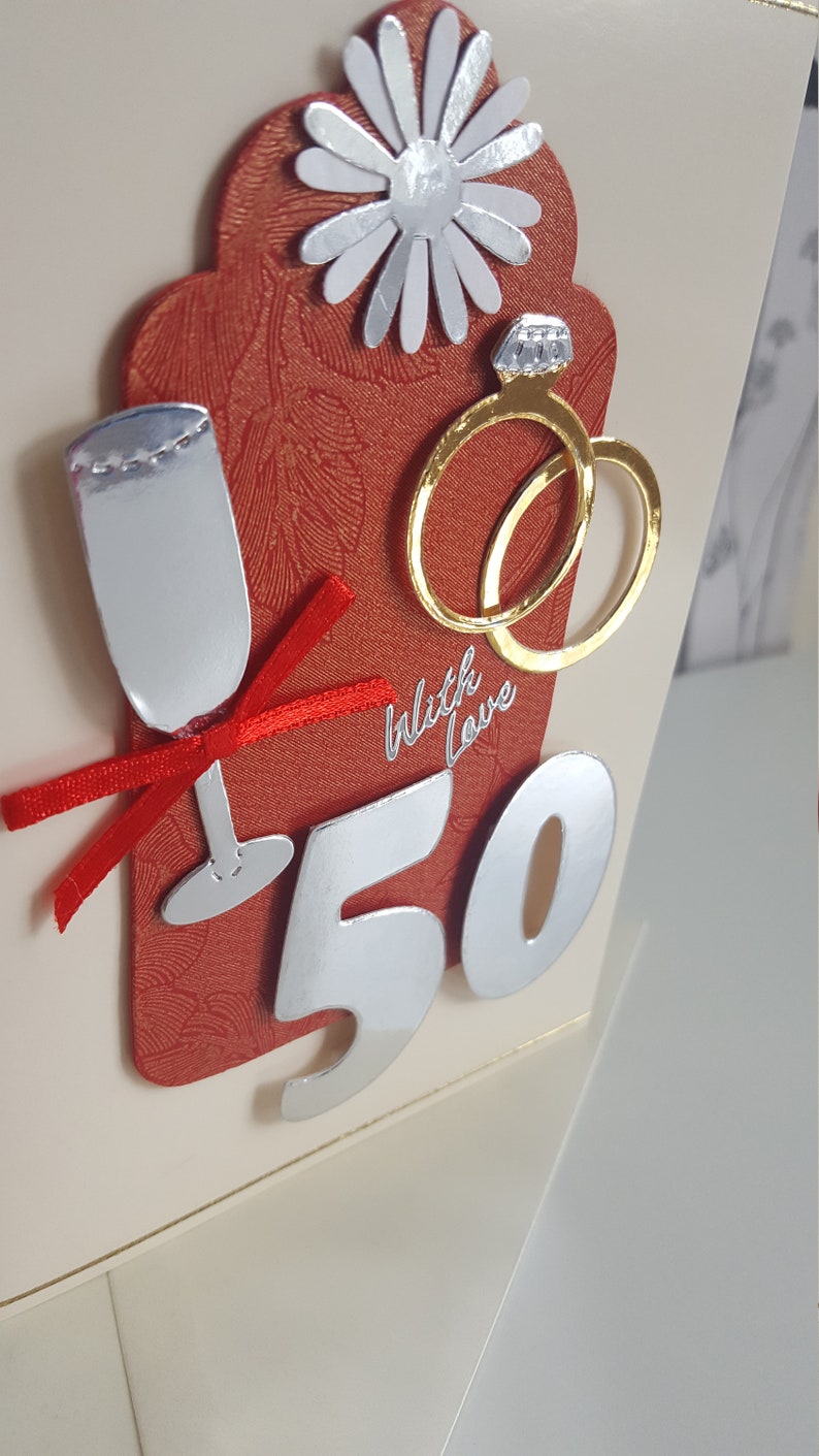 silver and gold on a cream card golden 50th wedding anniversary card in red