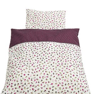 Blütenzauber: Puppenbettwäsche im romantischen Streublümchenmuster. 2teiliges Set für Puppenbett und Puppenwagen