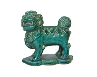 Green glazed ceramic guardian lion from the mid-Ming dynasty of China