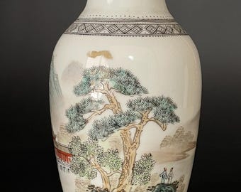 Porcelain vase decorated with a landscape with Chinese writing and a red mark