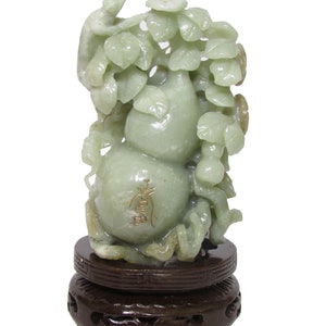 Chinese celadon jade gourd carved with flowers