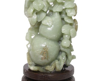 Chinese celadon jade gourd carved with flowers