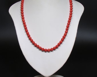 Colar de coral vermelho