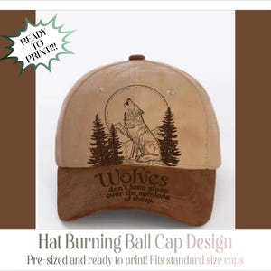May include: A tan and brown baseball cap featuring a wolf howling at the moon, with pine trees and the text "Wolves don't lose sleep over the opinions of sheep." The cap has a curved brim and a button on top.