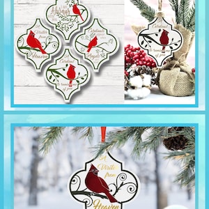 May include: A set of four quatrefoil-shaped ornaments featuring red cardinal birds perched on branches with text including 'A visitor from heaven', 'I am always with you', 'Cardinals appear when angels are near', and 'A cardinal to remind me of you'.