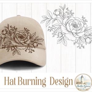 May include: A beige baseball cap featuring a dark brown line art illustration of a floral bouquet with peonies and leaves. To the right, the same floral design is displayed separately. The text "Hat Burning Design" appears below.