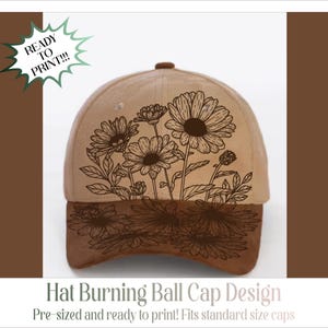 May include: A tan baseball cap featuring a dark brown line art illustration of a cluster of daisies and wildflowers. The text READY TO PRINT is visible in a green starburst graphic. The text Hat Burning Ball Cap Design is at the bottom.