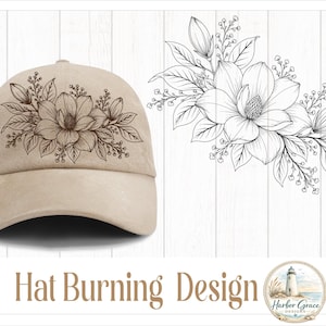 May include: A beige baseball cap featuring a dark brown line art illustration of a magnolia flower arrangement with leaves and buds. To the right is the same floral design in black line art. Below is the text Hat Burning Design.