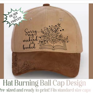 May include: A tan and brown baseball cap featuring the text "Sorry... my weekend is booked" and a floral design. The cap has a curved peak and a button on top. The words "READY TO PRINT!!!" are also on the hat.