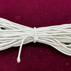Elastic cord for stringing dolls. - PRODOLLS