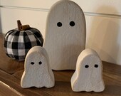 Small wooden Halloween ghosts. Rustic farmhouse ghost decoration