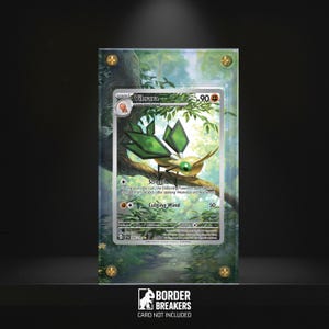 May include: A framed Pokémon card featuring a green and yellow Vibrava character. The card is displayed in a clear acrylic case with gold-colored corner accents. The background shows a forest scene.