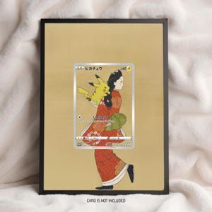 May include: Framed artwork with a Japanese-inspired illustration. It shows a woman in a red kimono holding a yellow Pikachu card. The black frame surrounds the artwork, set against a light tan background. The text "CARD IS NOT INCLUDED" is at the bottom.