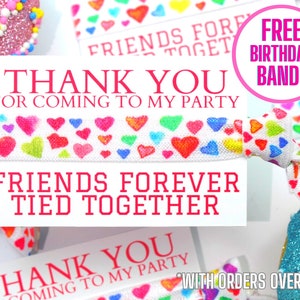 May include: Thank you for coming to my party! A white elastic bracelet with a colorful heart pattern and the text "Friends Forever Tied Together".  Free birthday band with orders over $10.