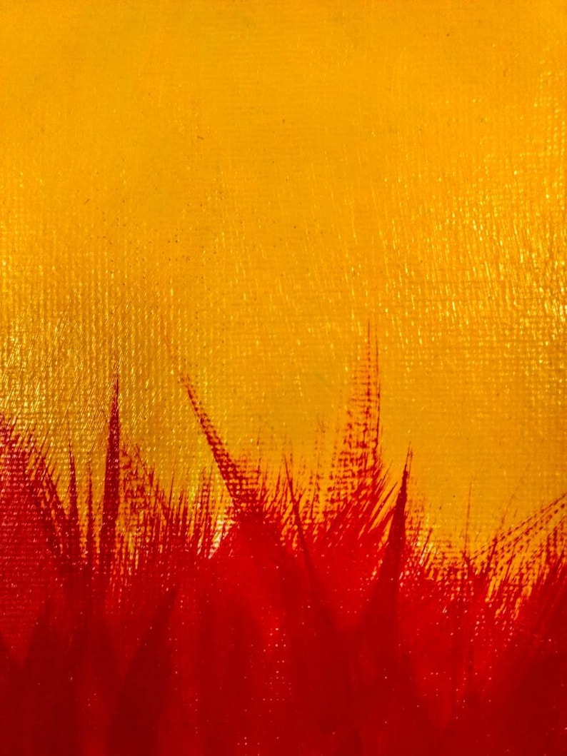 May include: Abstract painting with a textured canvas. The artwork features a gradient of yellow to red, with brushstrokes creating a grass-like effect at the bottom. The colors blend to create a warm, vibrant composition.