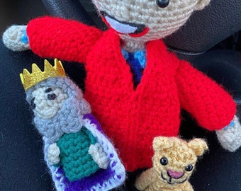 Mr. Rogers with King Friday and Daniel Tiger puppets
