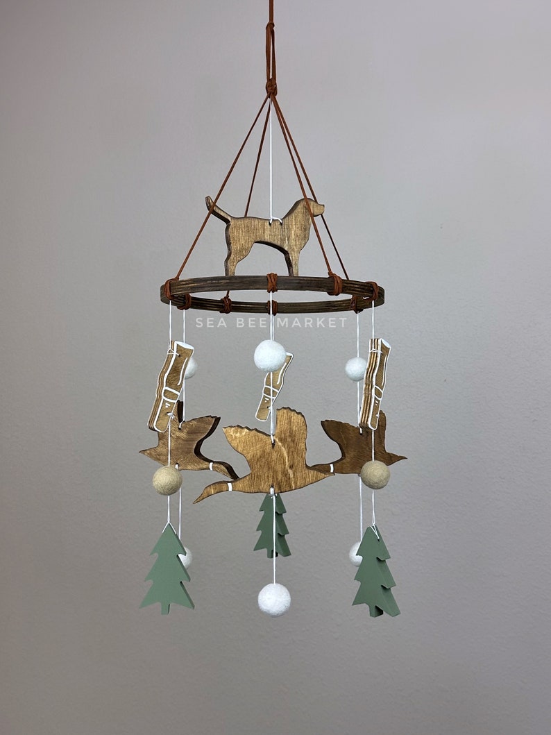 Duck Crib Mobile, Mallard Duck Calls, Green Trees, and a Hunting Dog