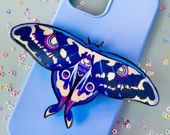 May include: A blue and black butterfly phone case with a white and purple design. The case is decorated with a 3D butterfly sticker.