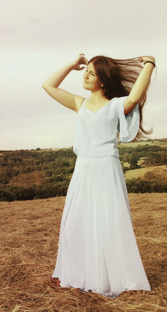 white flowy dress with sleeves