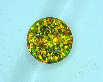 ラウンドカットのイエローファイアスフェーン宝石。「GIL 認定」 ラウンドカットのイエローファイアスフェーン宝石。「GIL 認定」