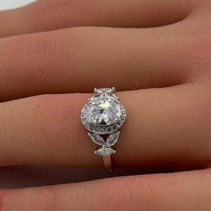 1.20 Carat Oval Art Deco Halo Engagement Ring Round Diamond Simulate 925 Sterling Silver Choose  Stone Color  Butterfly Marquise Accent