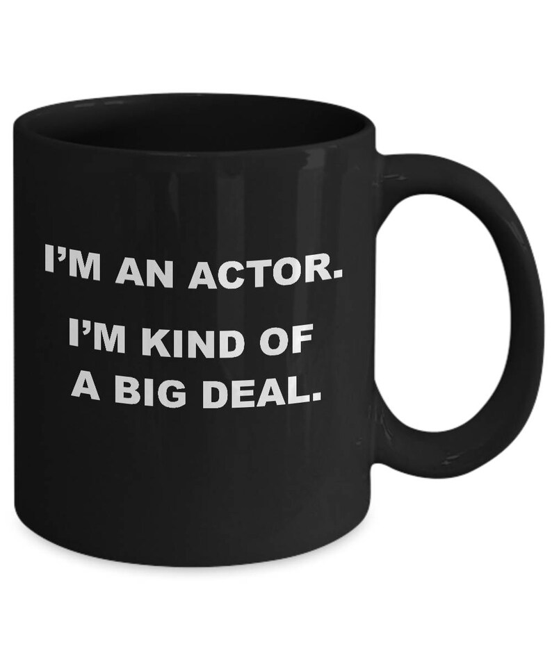 May include: Black ceramic coffee mug with a white, bold text that reads "I'M AN ACTOR. I'M KIND OF A BIG DEAL." The mug has a large handle and a glossy finish. Perfect for an actor or anyone with a sense of humor.