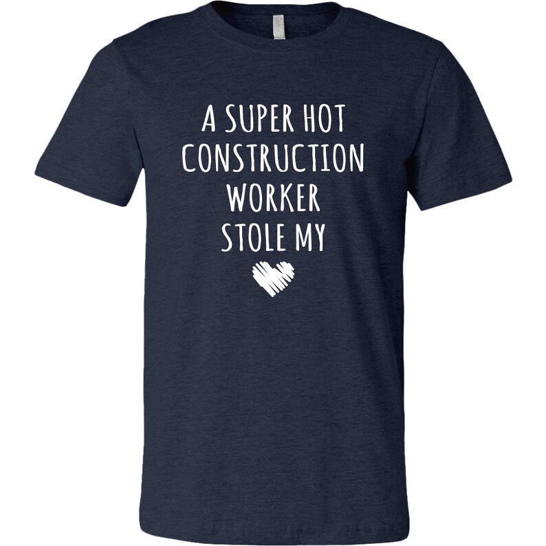 May include: A navy blue t-shirt with white text that reads "A super hot construction worker stole my heart".