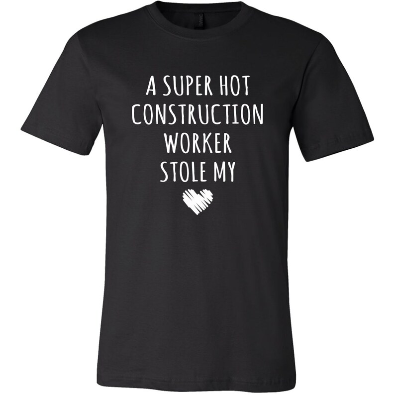 May include: Black t-shirt with white text that reads "A super hot construction worker stole my heart".