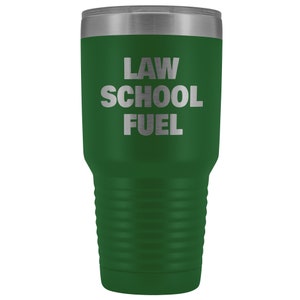 May include: Green stainless steel tumbler with a silver lid. The tumbler has the text "LAW SCHOOL FUEL" engraved on the front.