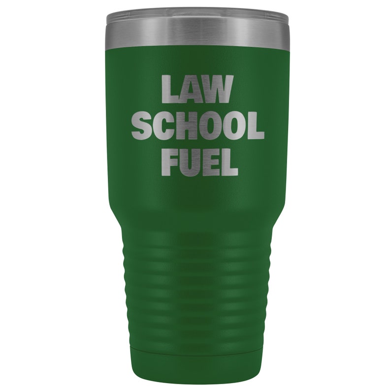 May include: Green stainless steel tumbler with a silver lid. The tumbler has the text "LAW SCHOOL FUEL" engraved on the front.