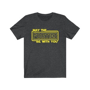 May include: Dark heather grey t-shirt with a yellow graphic that says "May the Forties Be With You".