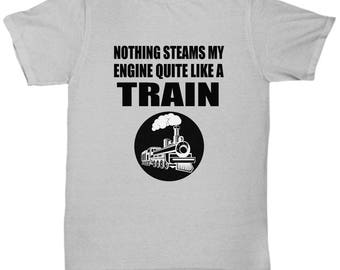 May include: A gray t-shirt with black text that reads "Nothing steams my engine quite like a train". A black and white illustration of a train with smoke coming from the chimney is below the text.
