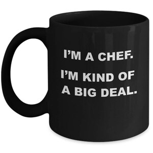 May include: Black coffee mug with white text that reads "I'm a chef. I'm kind of a big deal."