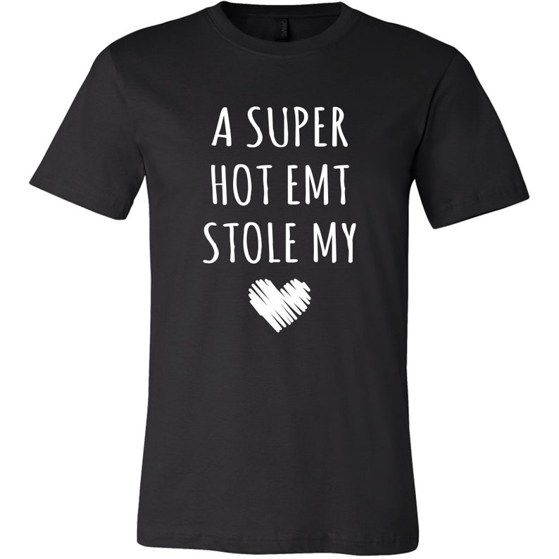May include: Black t-shirt with white text that reads "A super hot EMT stole my heart".