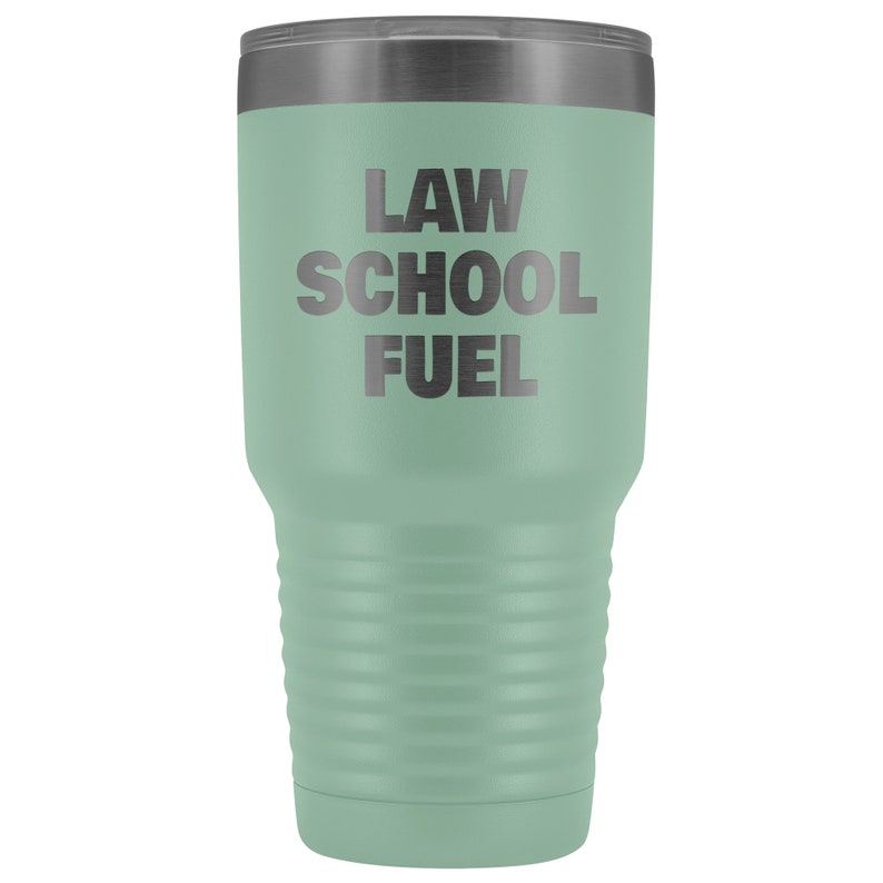May include: A green stainless steel tumbler with the text "LAW SCHOOL FUEL" in black lettering.