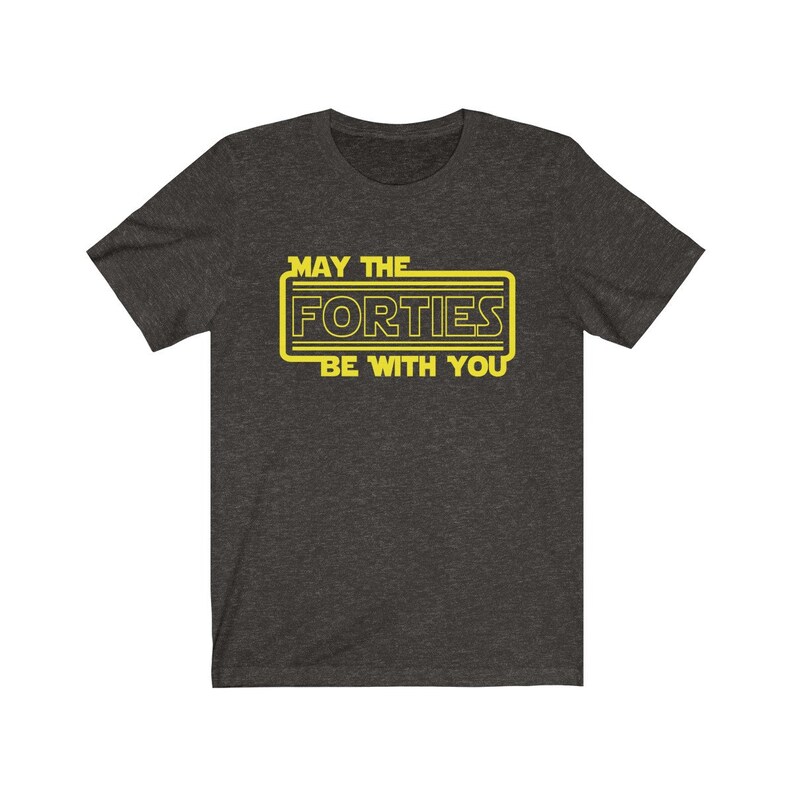 May include: A dark heather grey t-shirt with a yellow graphic that says "May the Forties Be With You".