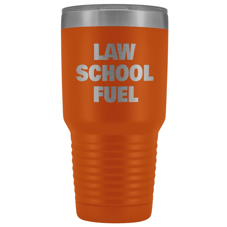 May include: Orange stainless steel tumbler with a silver lid and the text "LAW SCHOOL FUEL" printed on the side.