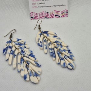 Ref. 09 - Bronze metal earrings with white and blue tortoiseshell acetate charm