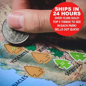 May include: A map of the United States with brown arrow stickers marking the locations of Yosemite, Kings Canyon, and Sequoia National Parks. The map is on a blue background with green and brown landmasses. A hand is holding a US quarter over the Yosemite sticker. The text "SHIPS IN 24 HOURS" is in a red circle at the top of the image. The text "OVER 15,000 SOLD! TOP 5 THINGS TO SEE IN EACH PARK! SELLS OUT QUICK!" is below the red circle.
