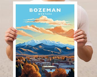 May include: A vintage-style travel poster featuring a scenic view of Bozeman, Montana. The poster depicts a mountain range with snow-capped peaks, a valley with a town, and a bright blue sky with fluffy clouds. The text "Bozeman, Montana" is printed in bold, white letters at the top of the poster.