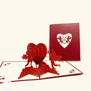 Tarjeta emergente 3D hecha a mano con amor de querubín